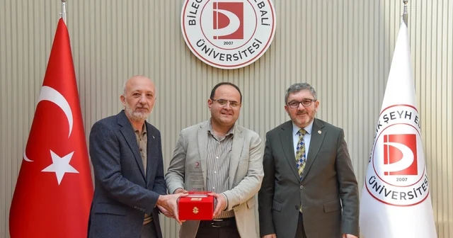 BŞEÜ ye gümüş madalya ve madalya beratı takdimi Bilecik Haberleri