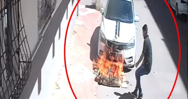 Çocuğun yaktığı karton, otomobili tutuşturdu; o anlar kamerada Sözcü Gazetesi