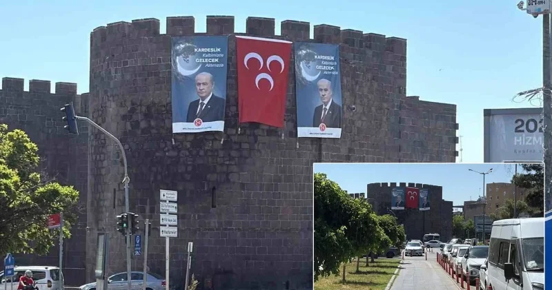 Diyarbakır ın tarihi surlarına Devlet Bahçeli nin posteri asıldı Politika Haberleri