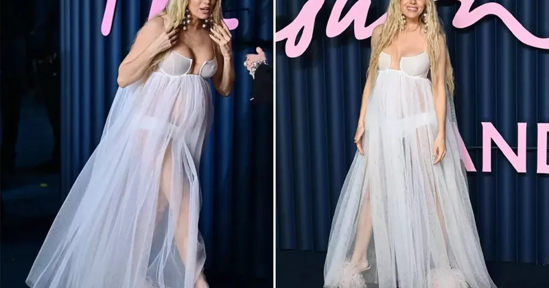 Ünlü oyuncu hamileliğini tül elbisesiyle kırmızı halıda duyurdu