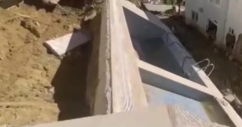 Son dakika: Antalya da sağanak sonrası havuz çöktü... 7 katlı apartman tahliye edildi Son dakika haberleri