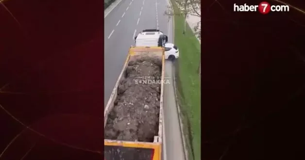 İzmir de dehşet anları! Hafriyat kamyonu otomobili önüne alıp metrelerce sürükledi