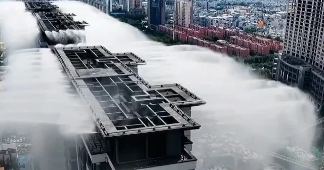 Çin den sıcaklara karşı çatıdan sis yöntemi VİDEO İZLE