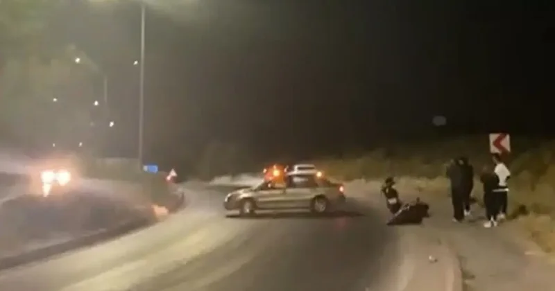 Düştüğü ıslak yolu kayda alırken, kadrajına başka bir kaza girdi