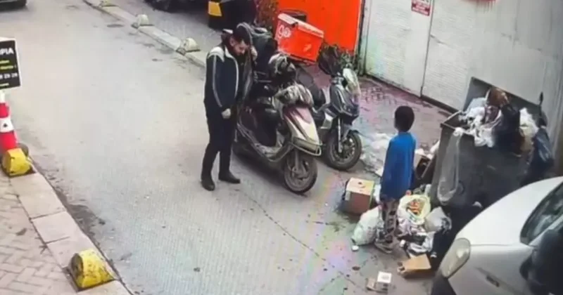 Soğukta üşüyen çocuğa ceketini çıkarıp veren kurye kameraya yansıdı