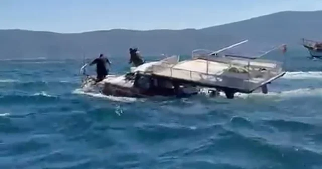 Güllük Körfezi nde amatör balıkçı teknesi battı Çevredeki denizciler, batmak üzere olan teknedeki vatandaşları kurtardı Muğla Haberleri