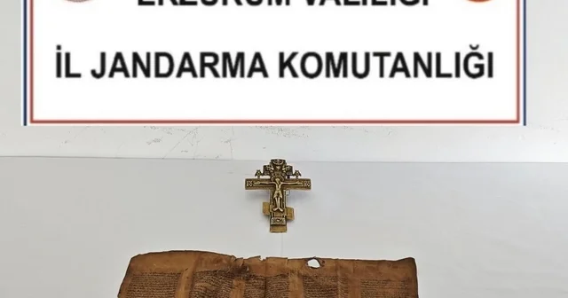 Erzurum da Orta Çağ dönemine ait parşömen ile bronz haç ele geçirildi Erzurum Haberleri