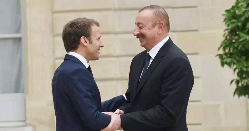 Macron dan İlham Aliyev e İran dan tahliye için teşekkür