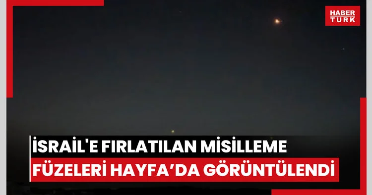 İran dan İsrail e fırlatılan misilleme füzeleri Hayfa semalarında görüntülendi