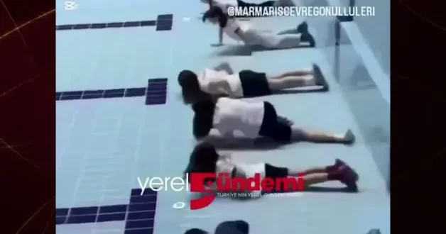 Sporcular boş havuzda kulaç attı, görüntüler tepki çekti
