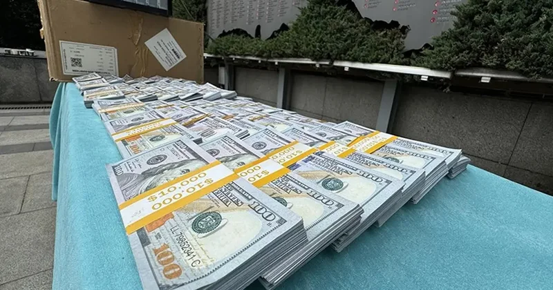 Hem ATM den hem para sayma makinesinden geçiyor! 50 dolar çetesi yakalandı