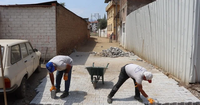 Nazilli Belediyesi yol çalışmalarını sürdürüyor Dumlupınar Mahallesi 349 sokaktaki yol yenilendi Aydın Haberleri Habertürk Yerel Haberler