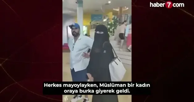 Çarşaflı kadına çirkin saldırı! Kıyafetin çocuklarımı korkutuyor