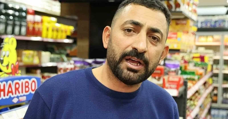 Aksaray da market sahibi uyurken çalınan çikolataları yiyen kişi kameraya yakalandı
