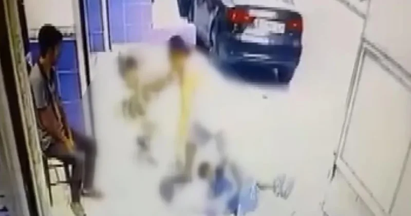 Gaziosmanpaşa da dehşet anları kamerada: Çocukları sokak ortasında darbetti!