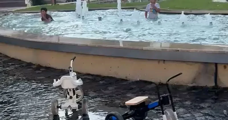 Bolu’da tehlikeli serinlik: Yasağa ve elektrik akımına aldırış etmeden süs havuzunda yüzdüler