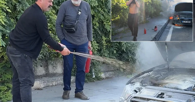 Yanan aracı kola ile söndürmeye çalıştı