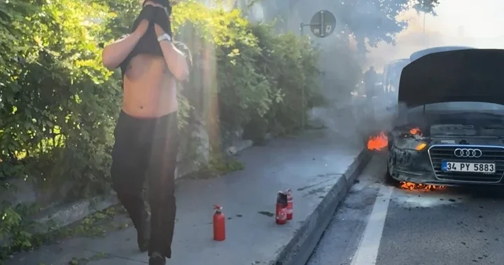 Kağıthane’de otomobil yangınına müdahale için kola şişesiyle koştu
