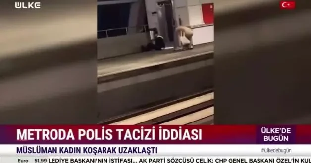 Hollanda da Müslüman kadını taciz ederek kovalayan polis yere kapaklandı