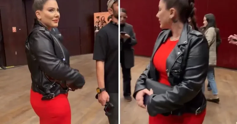 Ferit Kaya hayranlarıyla fotoğraf çektirirken eşinin bakışları dikkat çekti