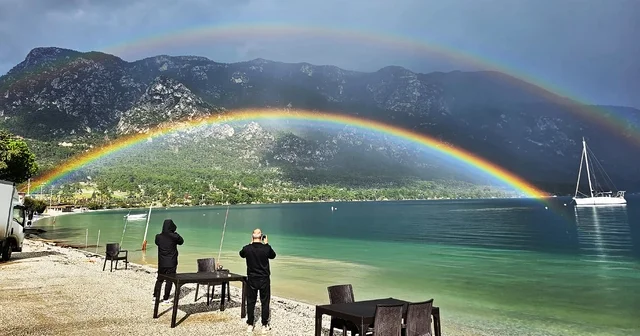 Muğla Akbük Koyu nda oluşan Gökkuşağı mest etti Muğla Haberleri