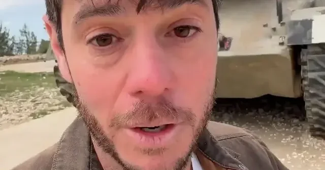 İsrailli Youtuber savaşı devam ettirebilmek için tankların önünde video çekerek para dilendi VİDEO İZLE