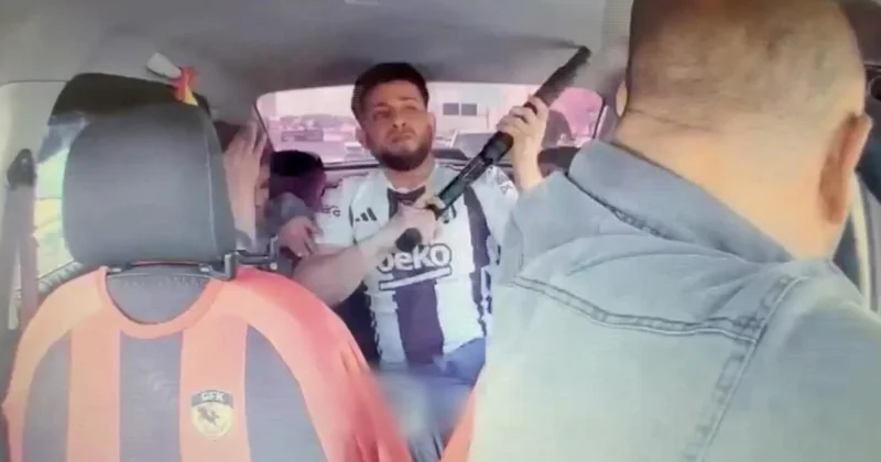 Rehine alınan taksicinin saldırganı engellediği anlar kamerada