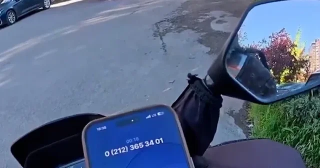 Güvenliğin içeriye almadığı motokuryeyi müşteri zorla ayağına çağırdı VİDEO İZLE