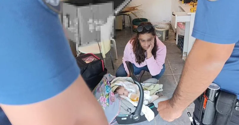 Hırsızlık ihbarına giden polis, özel garajda 5 aylık bebekle annesini buldu