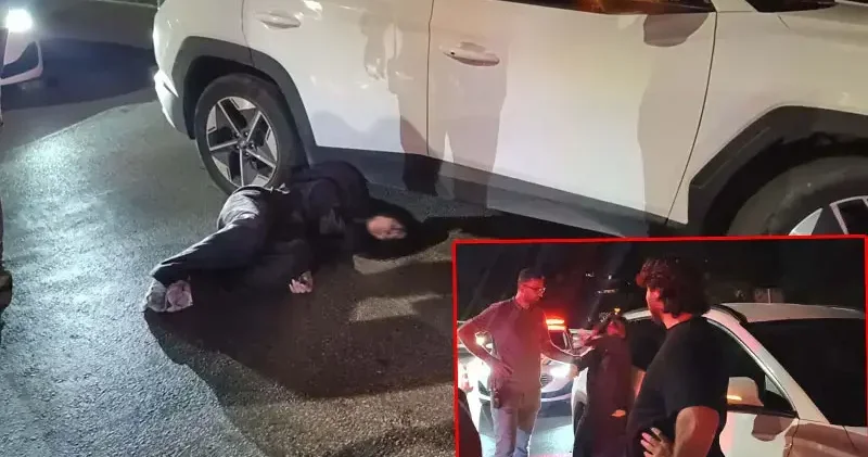 Otomobiliyle ters yöne giren sürücü polise direnip, gazetecilere tükürdü