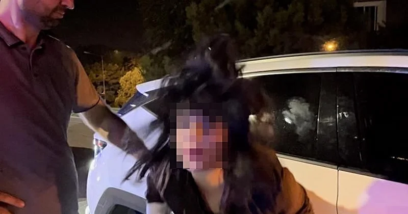 Polise direnen, gazeteciye tüküren alkollü kadın tutuklandı