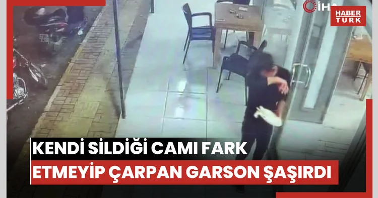 Kendi sildiği camı fark etmeyip yüzünü çarpan garson neye uğradığını şaşırdı