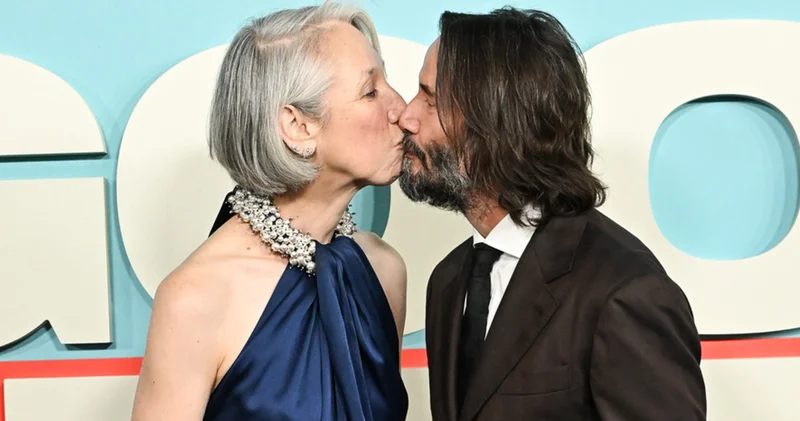 Keanu Reeves kız arkadaşı Alexandra Grant ile kırmızı halıda öpüştü