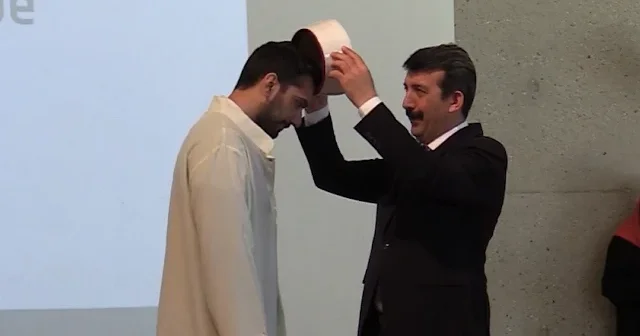 Almanya da DİTİB in eğittiği din görevlileri cübbelerini giydi VİDEO İZLE