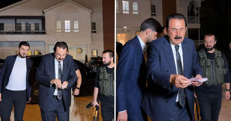Ertoşi aşiretinin lideri İskender Ertuş aracından iner inmez para dağıttı