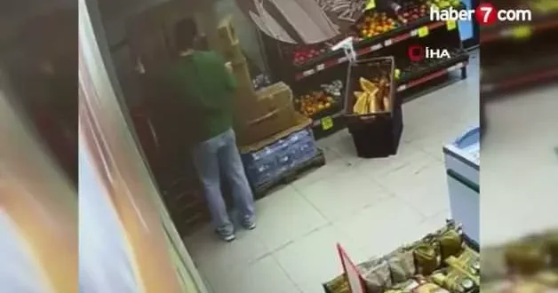 Markette yangın tüpü yere düşünce çalışan panikle kaçıştı