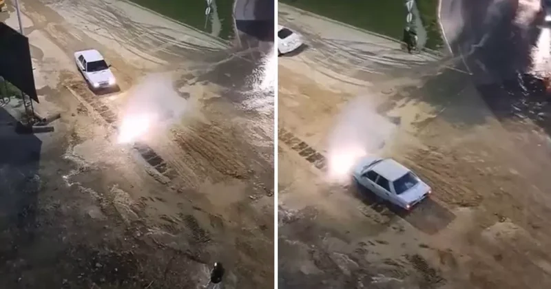 Krizi fırsata çevirdi, patlayan suda aracını yıkadı