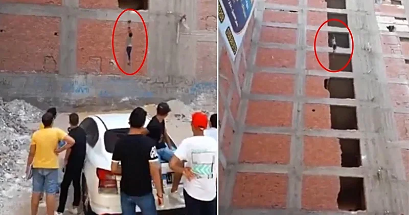 İnşaatta akılalmaz yöntem! İşçileri halatla taşıdılar