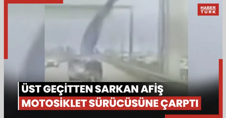 Üst geçitten sarkan afiş motosiklet sürücüsüne çarptı