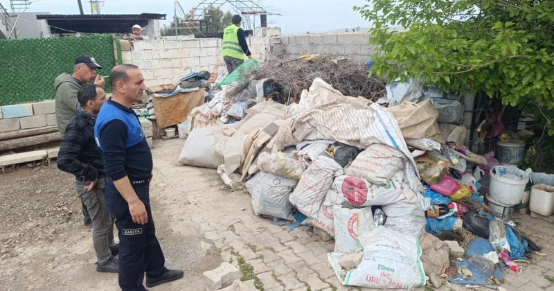 Reyhanlı da bir evden 6 kamyon çöp çıkarıldı