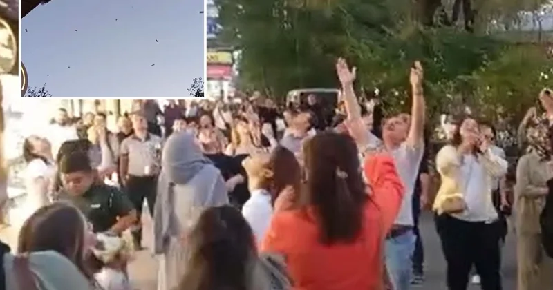 Klip çekiminde binadan para atıldı, vatandaşlar kapıştı