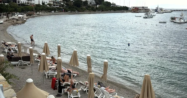 Bodrum da sağanağa rağmen turistler denize girdi Muğla Haberleri
