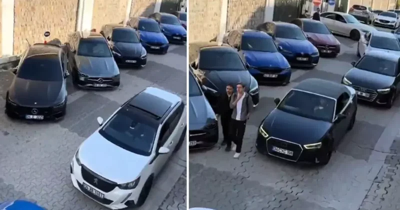 Üniversitenin otoparkında sıra sıra dizilen otomobillere bakın