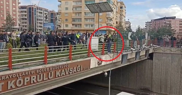 Üst geçitten atlamak isteyen kişiyi polis kurtardı Diyarbakır Haberleri