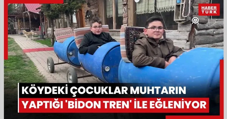 Köydeki çocuklar muhtarın yaptığı bidon tren ile eğleniyor