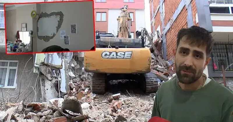 Küçükçekmece de iş makinesi yıkım sırasında yandaki apartmanın duvarını yıktı: Ev sallanıyor