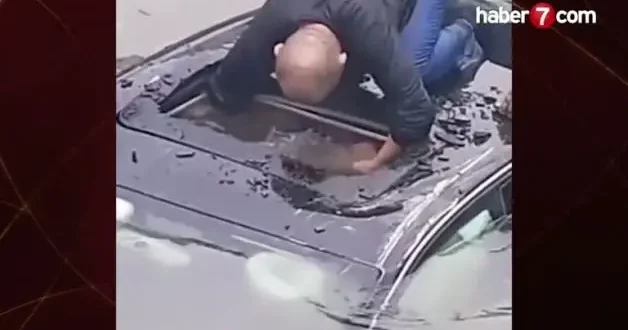 Nehre atladı, camı kırıp hayat kurtardı! Çinli eski askerin kahramanlığı kamerada