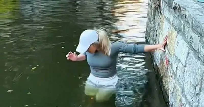 E coli uyarılarını umursamayan kadın telefonu için nehre girdi