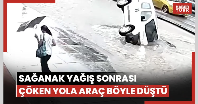 Sağanak yağış sonrası çöken yola araç böyle düştü