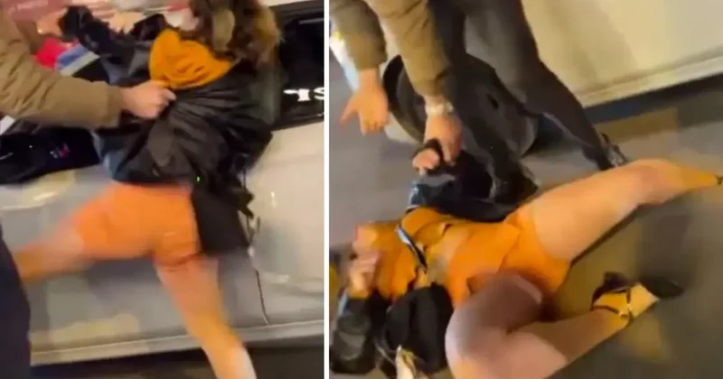 Sinir krizi geçiren bir kadın, vatandaşlara saldırıp kendini yerlere attı